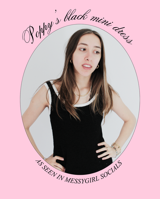 Poppy's black mini dress